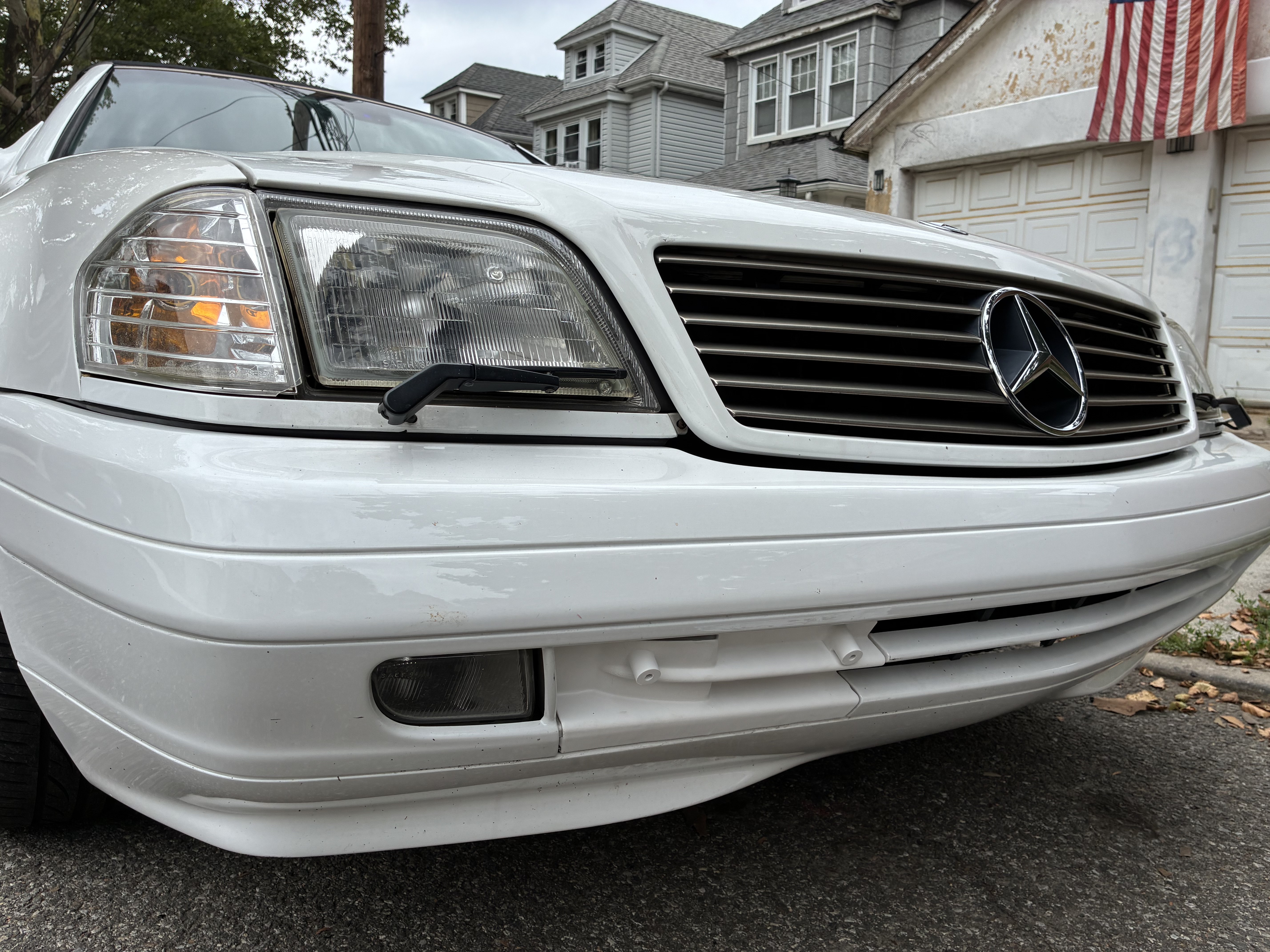 R129 Facelift Front Bumper Tow Hook Cover with License Plate Mount thumbnail